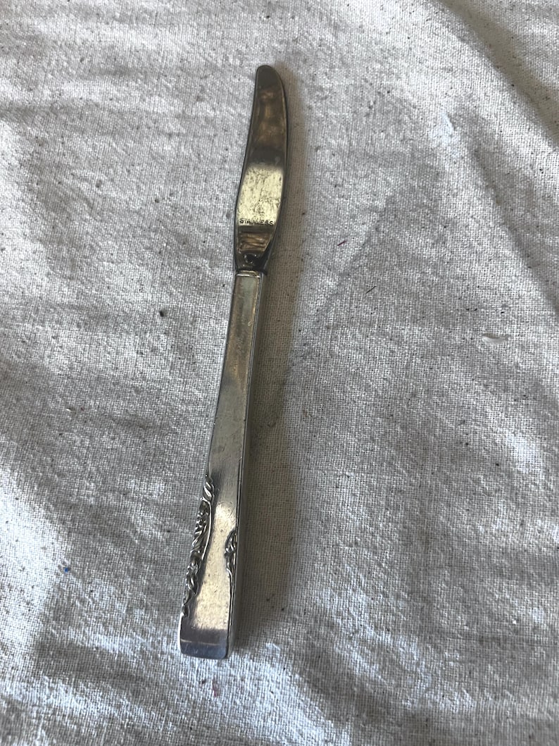 Vintage Stainless and silverplate ornate butter knife