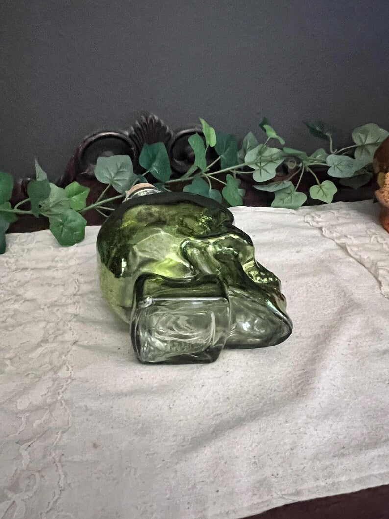 Green lighted glass skull jar