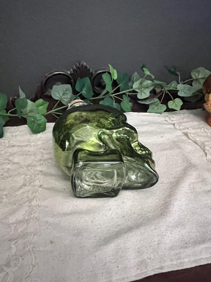 Green lighted glass skull jar