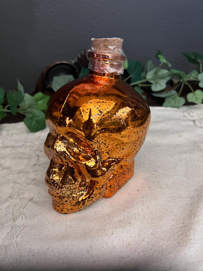 Green lighted glass skull jar