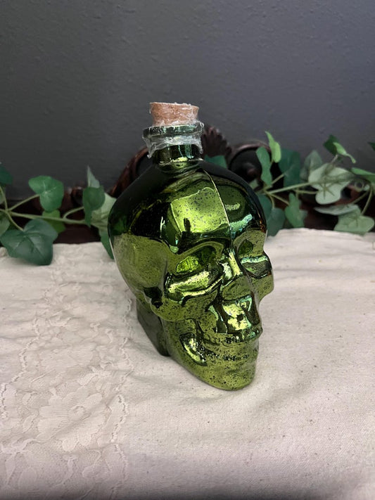 Green lighted glass skull jar
